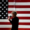 IMG_4195-MBay-w-mic-and-Flag-bg-HERO-xl